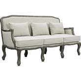 Tania Sofa in Cream Linen with Nailhead & Wood