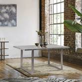 Fenton 63" Dining Table in Brushed Stainless Steel with Cement Grey Top