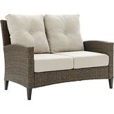Rockport Outdoor High Back Loveseat in Light Brown Wicker & Oatmeal Cushions
