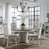 River Place 5-Piece Pedestal Dining Set in Distressed White & Brown Wood